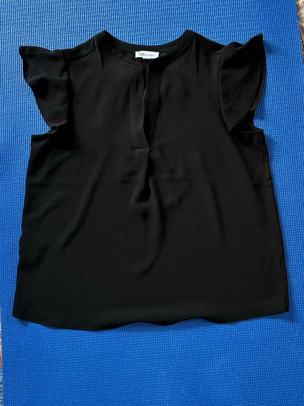 Women’s ruffle sleeved Calvin Klein top…worn once